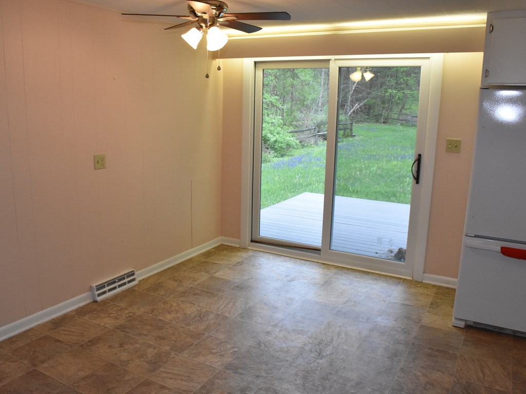 16475 Harmonsburg Road Meadville, PA 16335 - Photo 16 of 35 a view of an empty room with a window