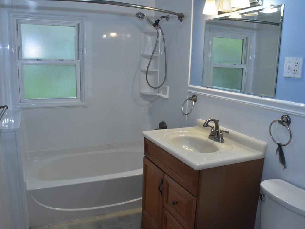 16475 Harmonsburg Road Meadville, PA 16335 - Photo 17 of 35 a bathroom with a sink vanity mirror and toilet