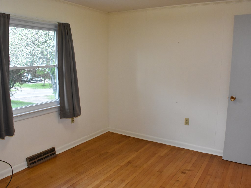 16475 Harmonsburg Road Meadville, PA 16335 - Photo 19 of 35 a view of a room with wooden floor and a window