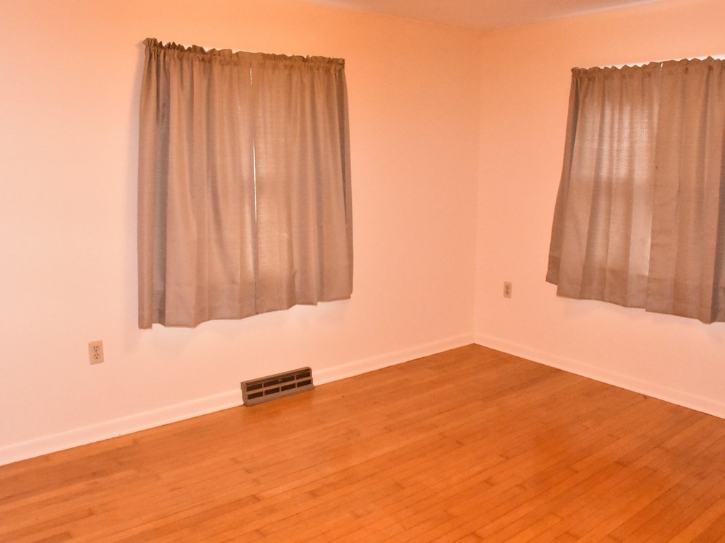16475 Harmonsburg Road Meadville, PA 16335 - Photo 25 of 35 an empty room with a wooden door