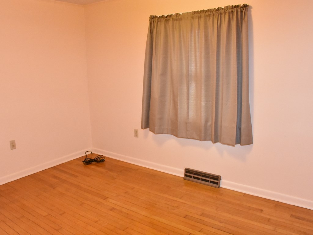 16475 Harmonsburg Road Meadville, PA 16335 - Photo 27 of 35 a view of a room with wooden floor and a window