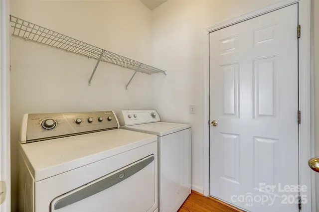 a view of entryway with kitchen