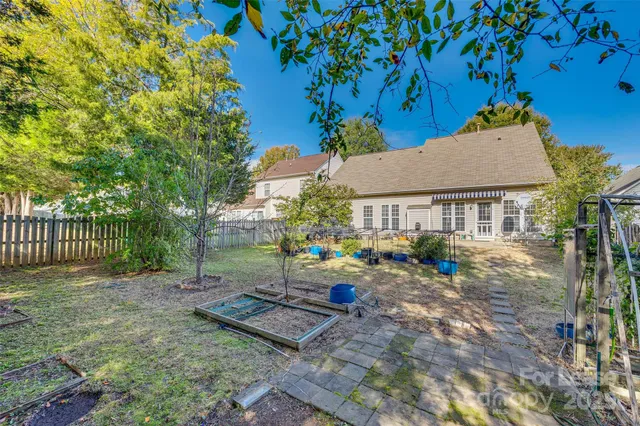 a view of outdoor space with deck and yard