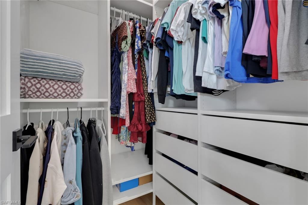 3748 Everglades Boulevard North Naples, FL 34120 - Photo 24 of 49 a view of walk in closet with clothes