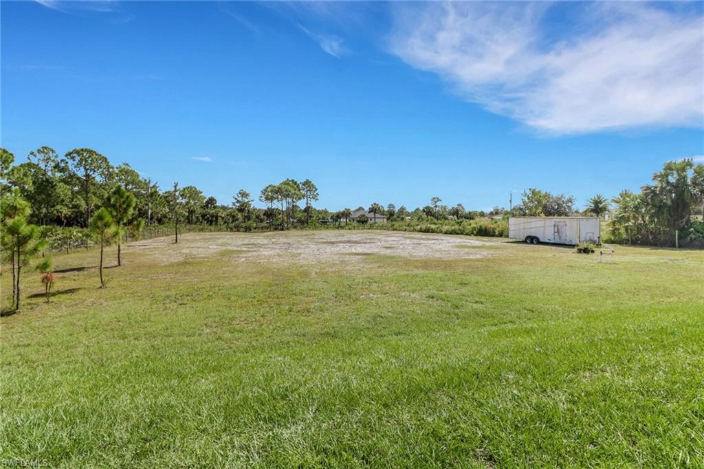 3748 Everglades Boulevard North Naples, FL 34120 - Photo 38 of 49 a view of a lake with houses in the back