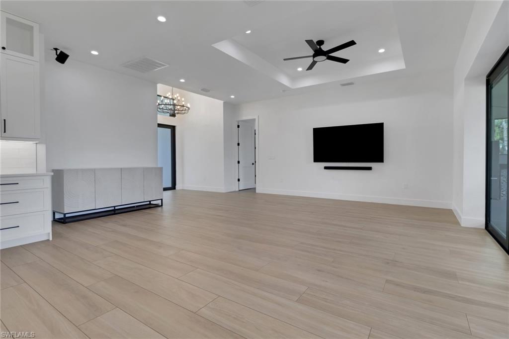 3748 Everglades Boulevard North Naples, FL 34120 - Photo 8 of 49 a view of an empty room with a flat screen tv