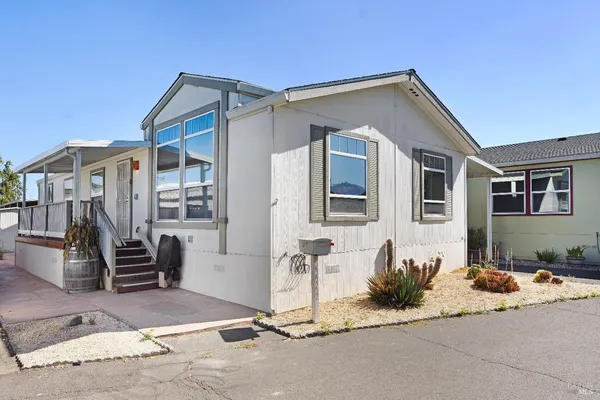 a view of a house with a patio