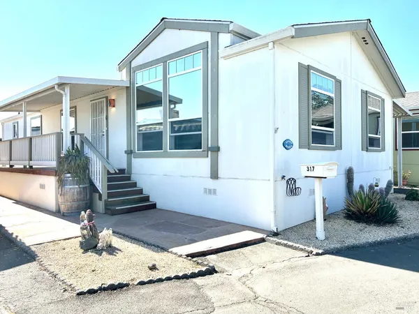 a house view with a outdoor space
