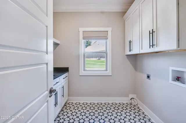 a bathroom with a sink a toilet and a window