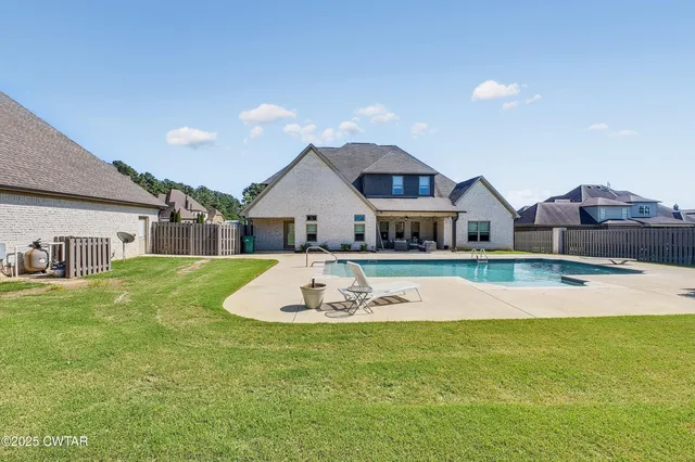 a view of house with garden