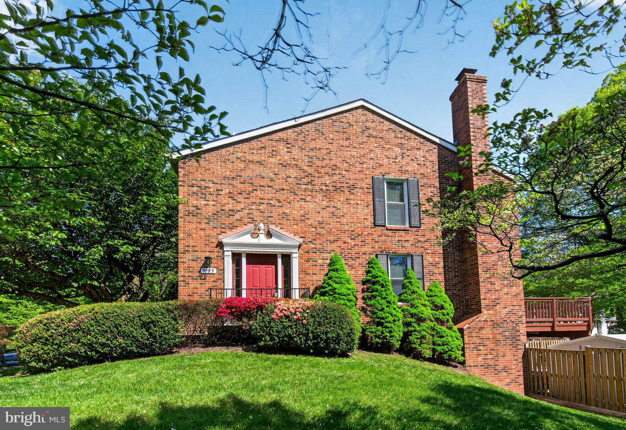 9129 Blarney Stone Drive Springfield, VA 22152 - Photo 2 of 34 Charming brick home with lush greenery.