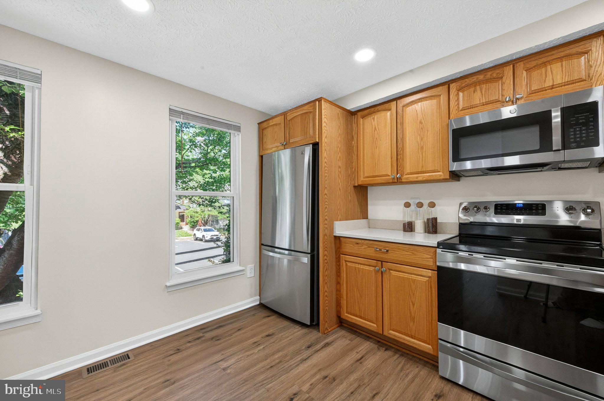 9129 Blarney Stone Drive Springfield, VA 22152 - Photo 5 of 34 Bright and modern kitchen space.