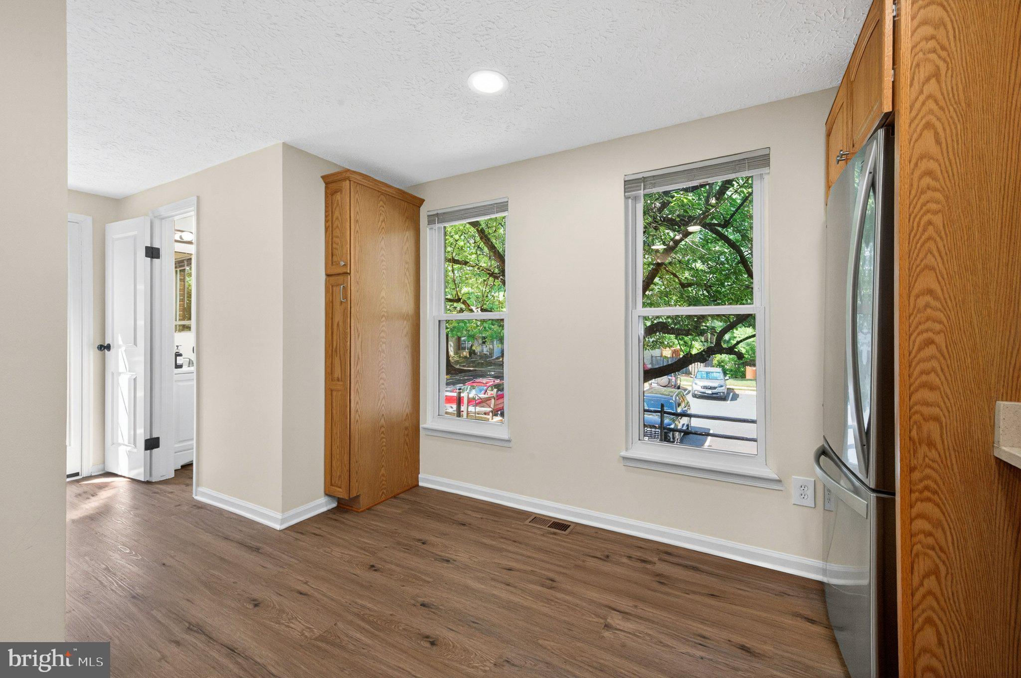 9129 Blarney Stone Drive Springfield, VA 22152 - Photo 6 of 34 Bright and airy kitchen with views.