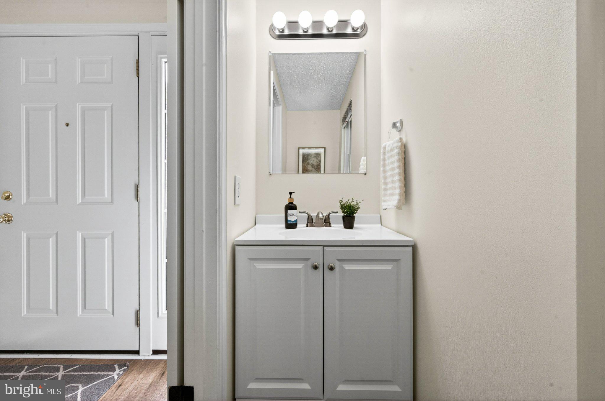 9129 Blarney Stone Drive Springfield, VA 22152 - Photo 7 of 34 Charming entryway with modern flair.