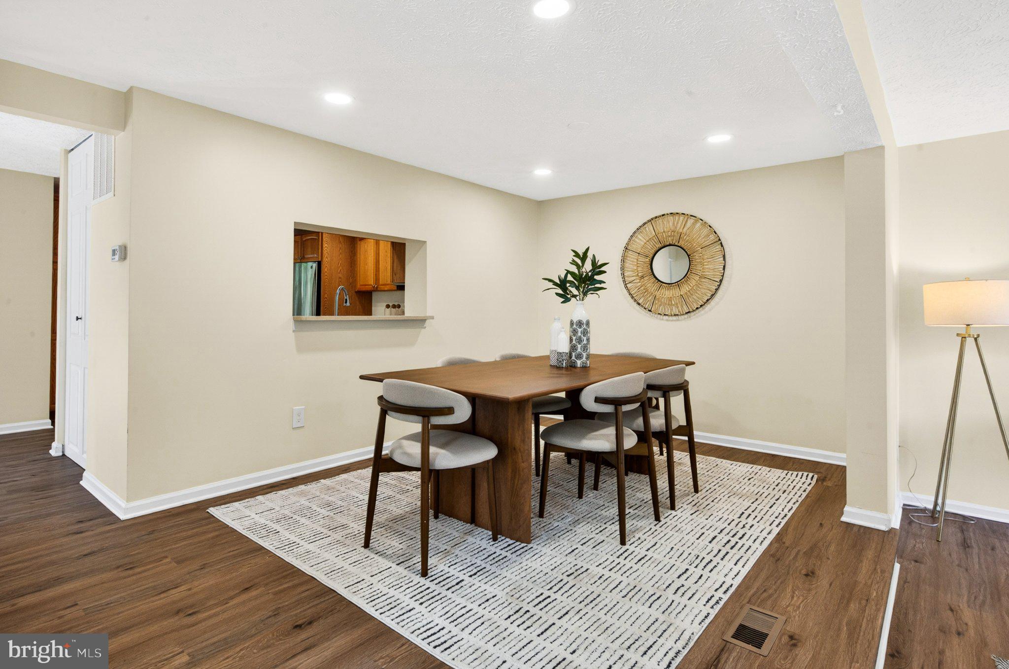 9129 Blarney Stone Drive Springfield, VA 22152 - Photo 8 of 34 Modern dining space with warm tones.