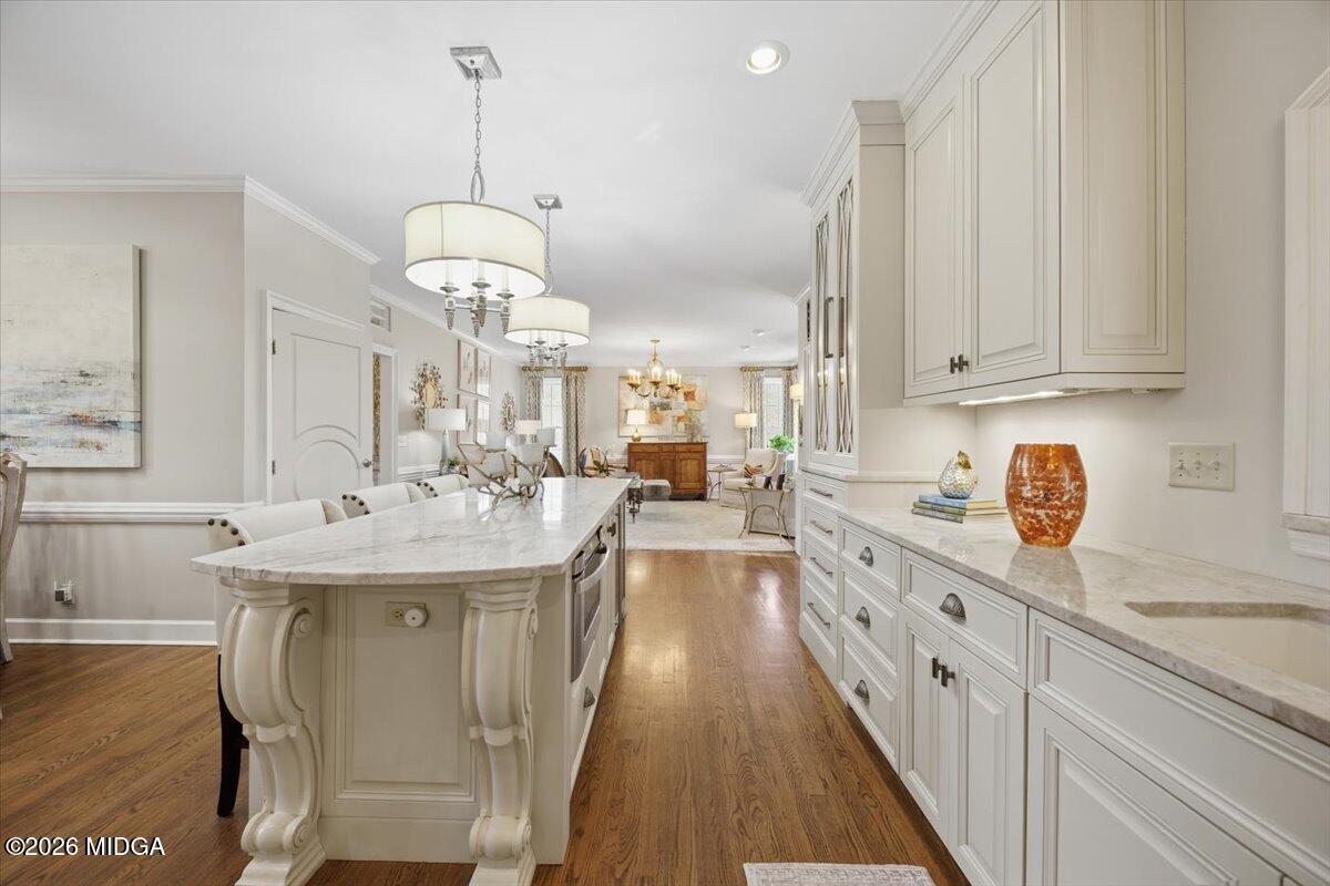 102 Merion Park Macon, GA 31210 - Photo 11 of 54 a kitchen with stainless steel appliances granite countertop a sink stove and refrigerator