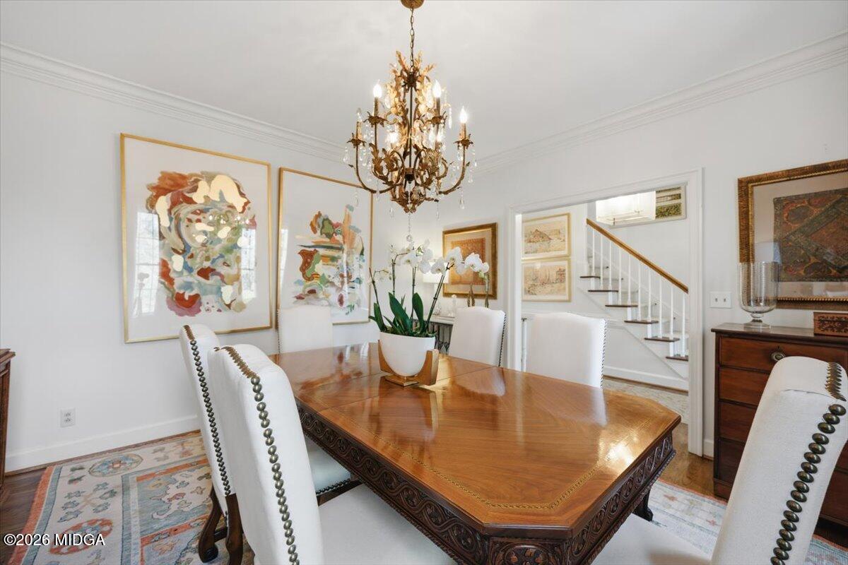 102 Merion Park Macon, GA 31210 - Photo 16 of 54 a dining room with furniture a large window and wooden floor
