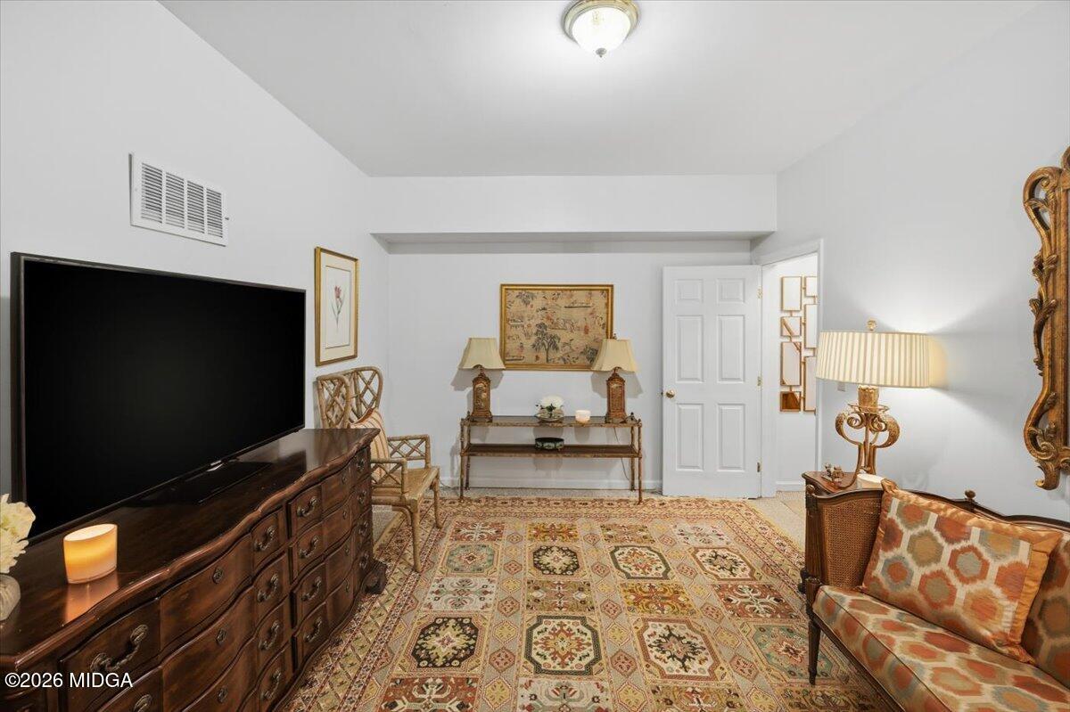 102 Merion Park Macon, GA 31210 - Photo 32 of 54 a living room with furniture and a flat screen tv