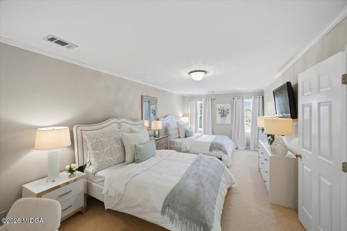 102 Merion Park Macon, GA 31210 - Photo 34 of 54 a bedroom with a bed and a lamp with window