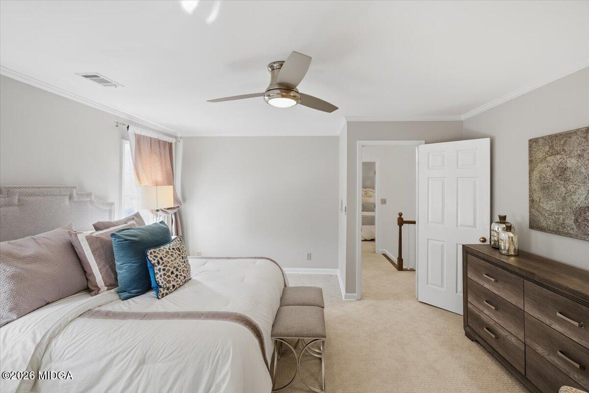 102 Merion Park Macon, GA 31210 - Photo 37 of 54 a bedroom with a bed and ceiling fan