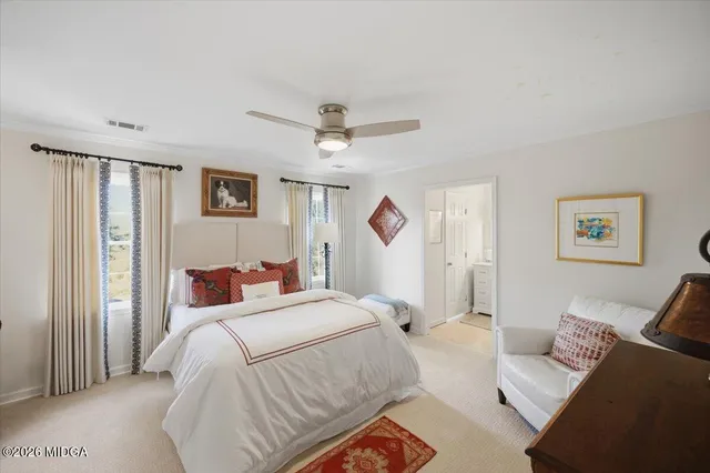 a view of a patio with furniture and wooden floor