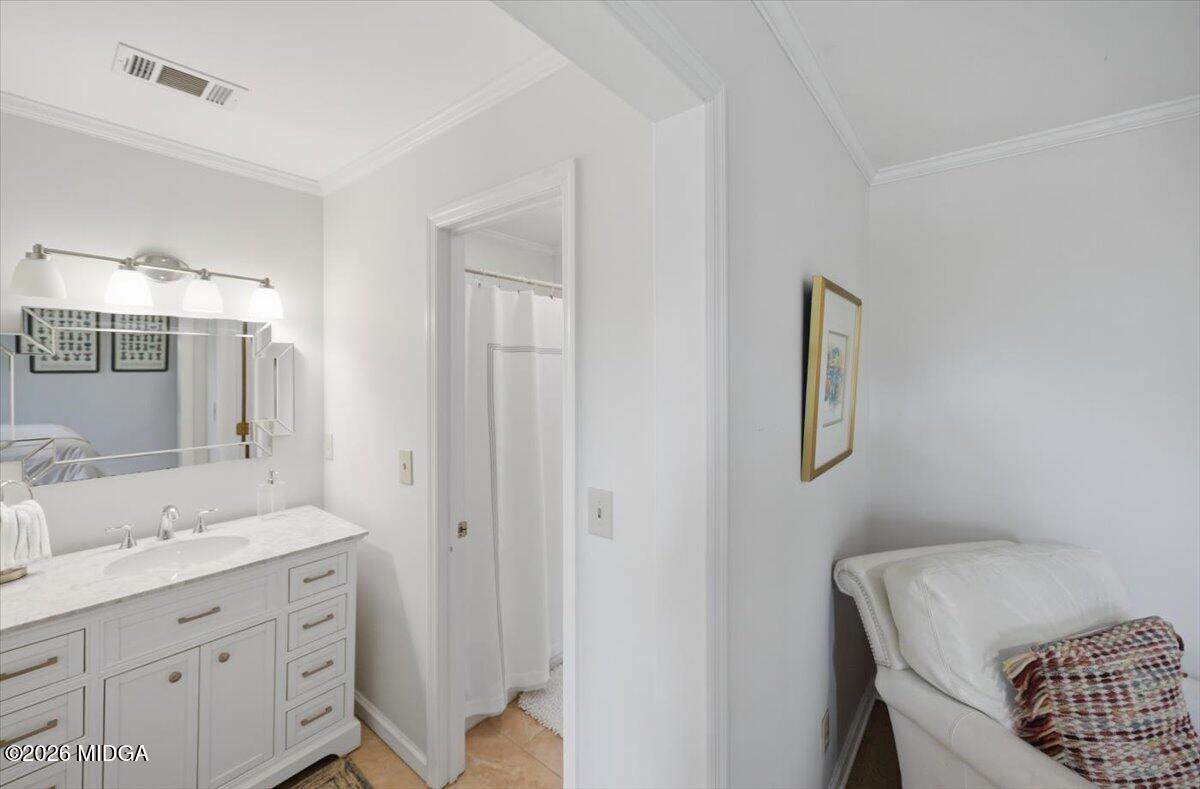 102 Merion Park Macon, GA 31210 - Photo 40 of 54 a bathroom with a granite countertop sink and a mirror