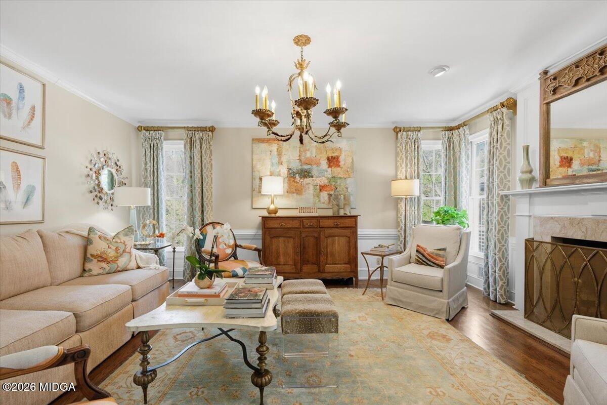 102 Merion Park Macon, GA 31210 - Photo 5 of 54 a living room with fireplace furniture and a chandelier