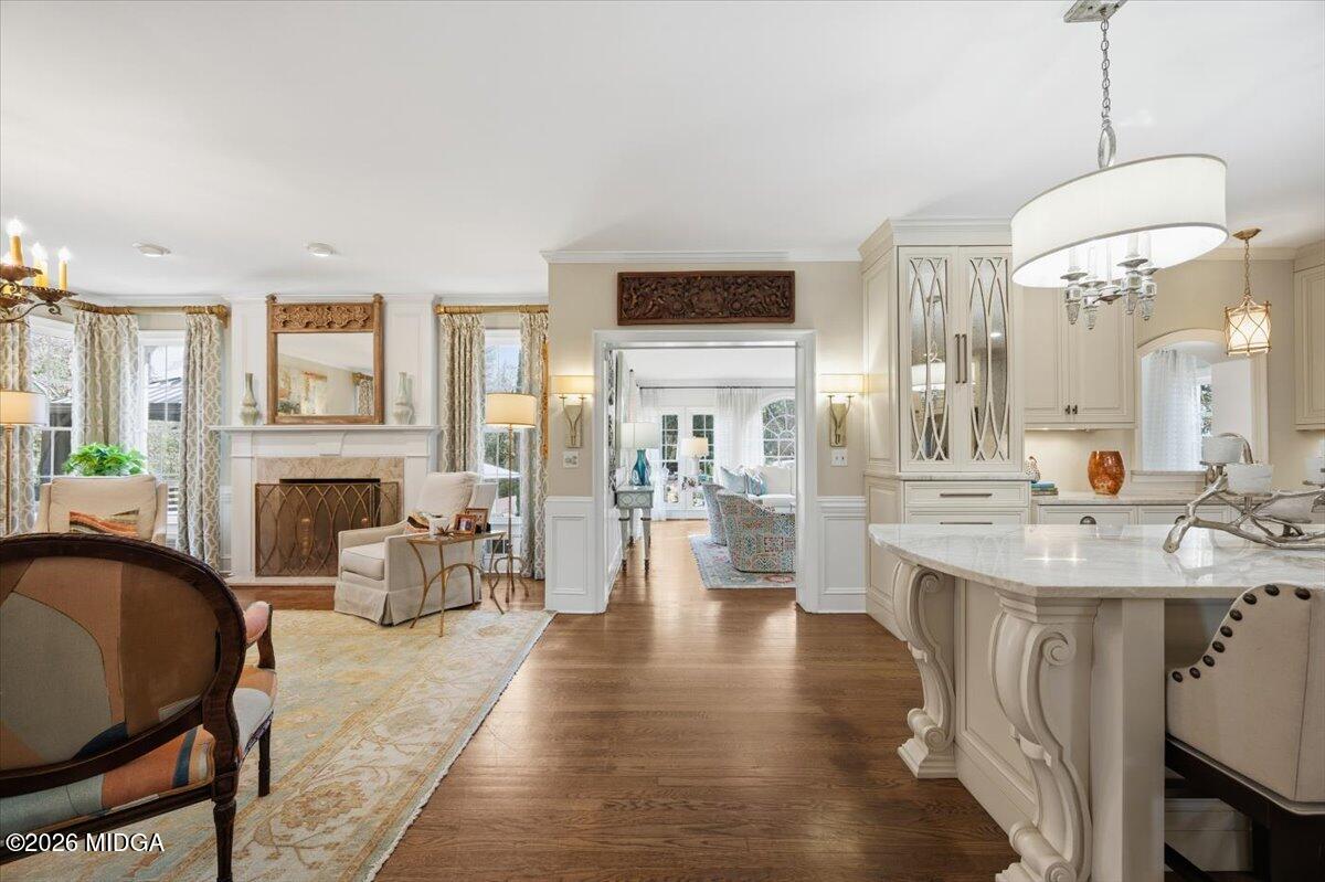 102 Merion Park Macon, GA 31210 - Photo 10 of 54 a dining room with wooden floor a glass table and chairs