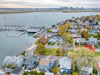 a view of an ocean and city