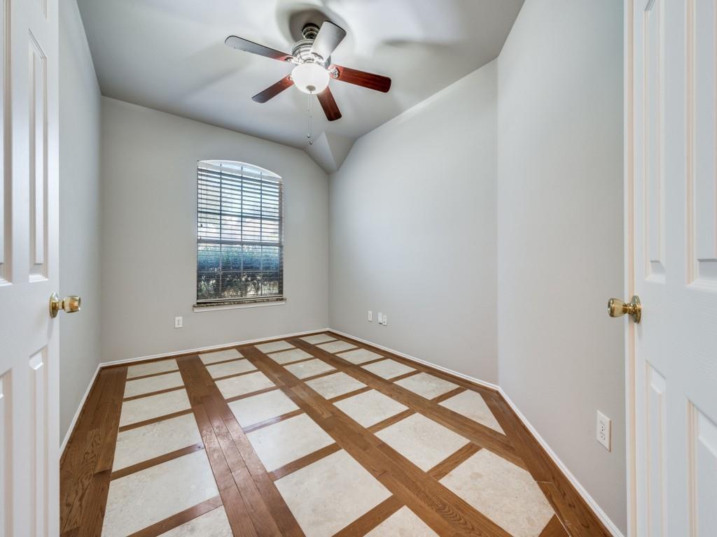 4445 Stones River Road Grand Prairie, TX 75052 - Photo 9 of 13 a view of an empty room with a window