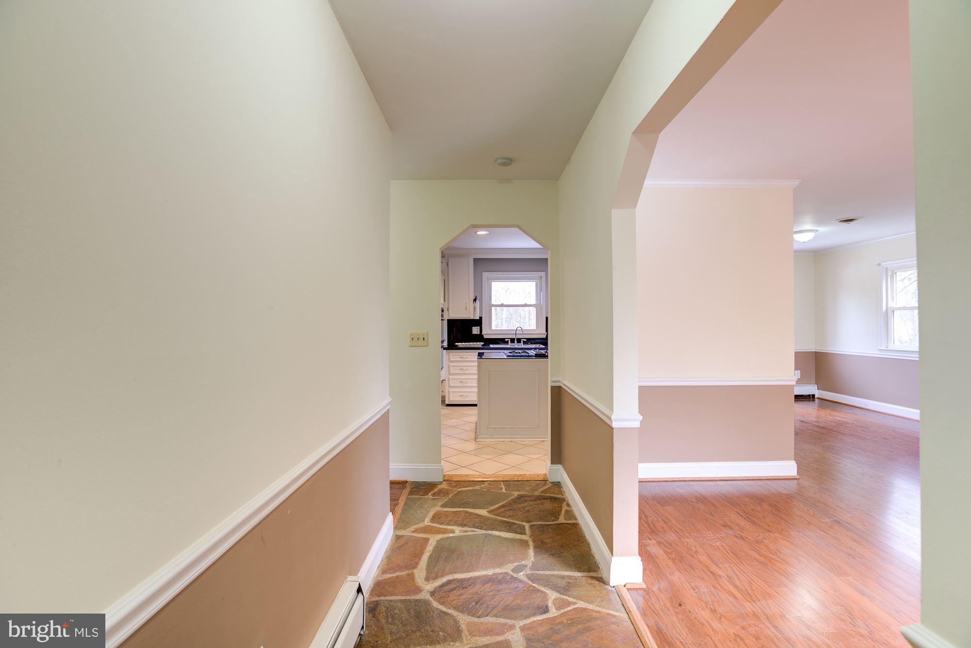 8203 Frye Road Alexandria, VA 22309 - Photo 2 of 34 Beautiful archways in living areas.