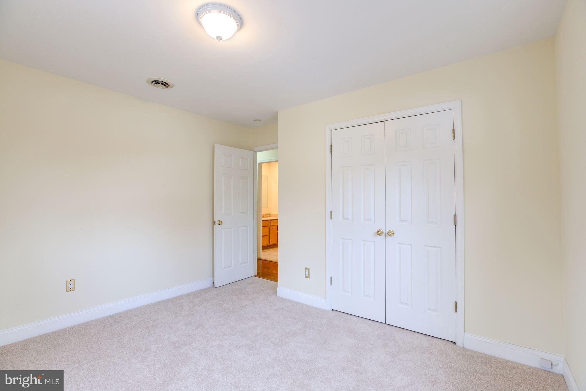 8203 Frye Road Alexandria, VA 22309 - Photo 15 of 34 Upper level bedroom closet