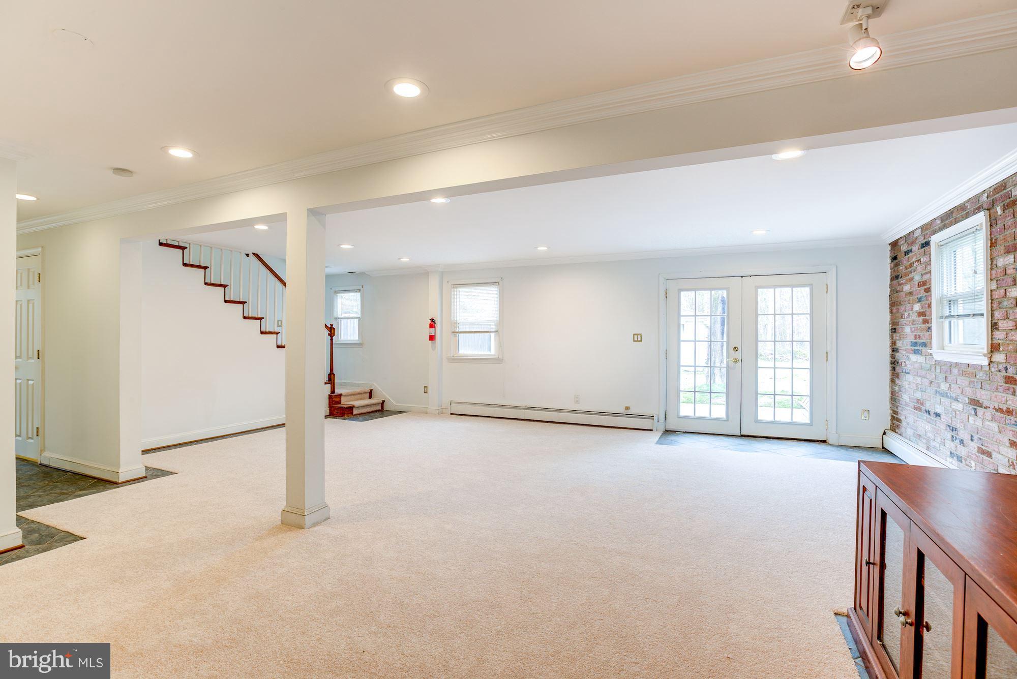 8203 Frye Road Alexandria, VA 22309 - Photo 19 of 34 Newly carpetted family room.