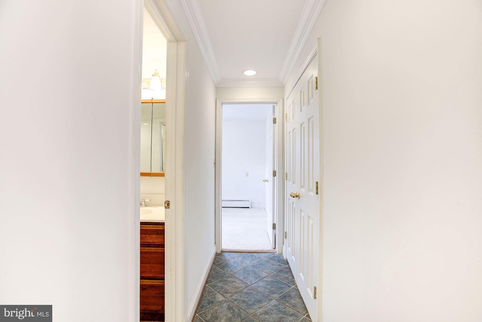 8203 Frye Road Alexandria, VA 22309 - Photo 22 of 34 Downstairs hall leading to bedrooms