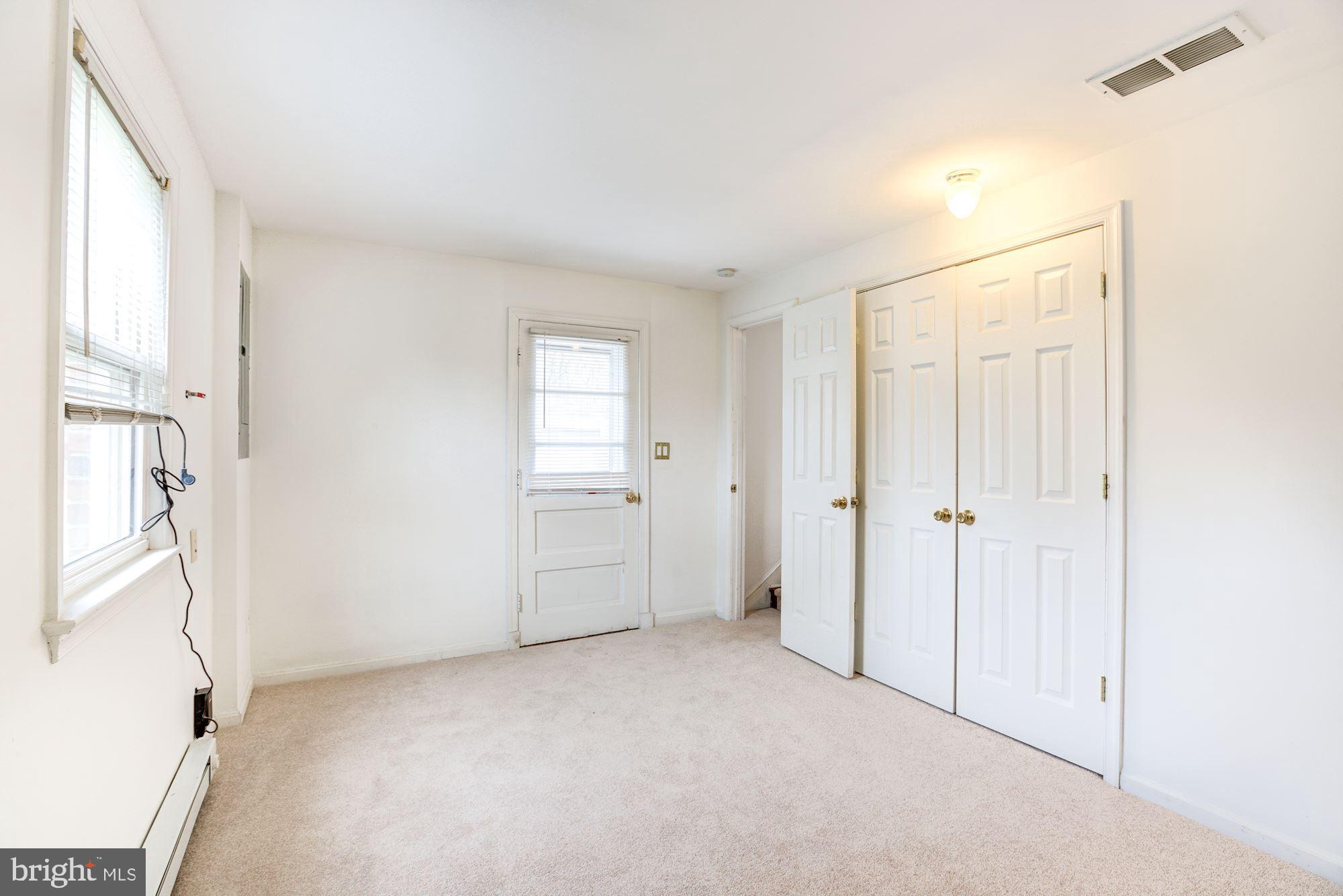 8203 Frye Road Alexandria, VA 22309 - Photo 27 of 34 Lower level bedroom with outside access.