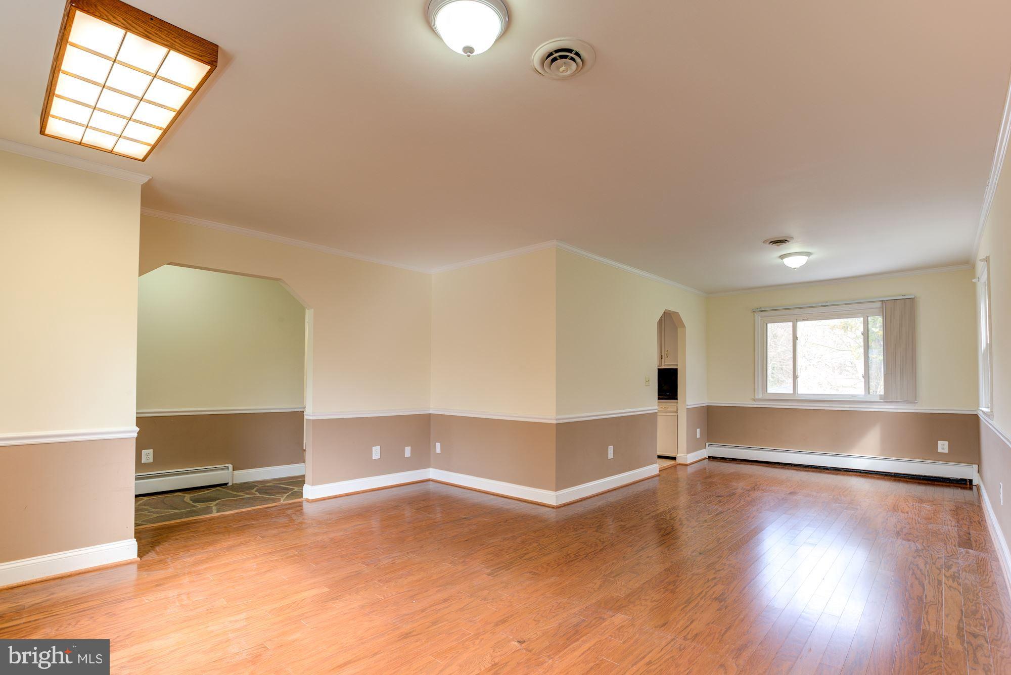 8203 Frye Road Alexandria, VA 22309 - Photo 4 of 34 From living room looking to dining room.