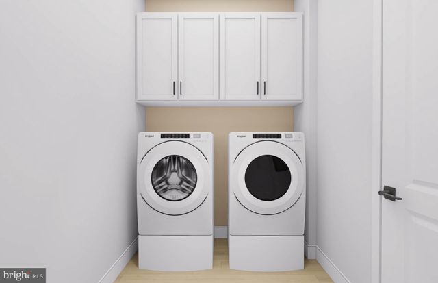 a bathroom with a toilet sink and shower