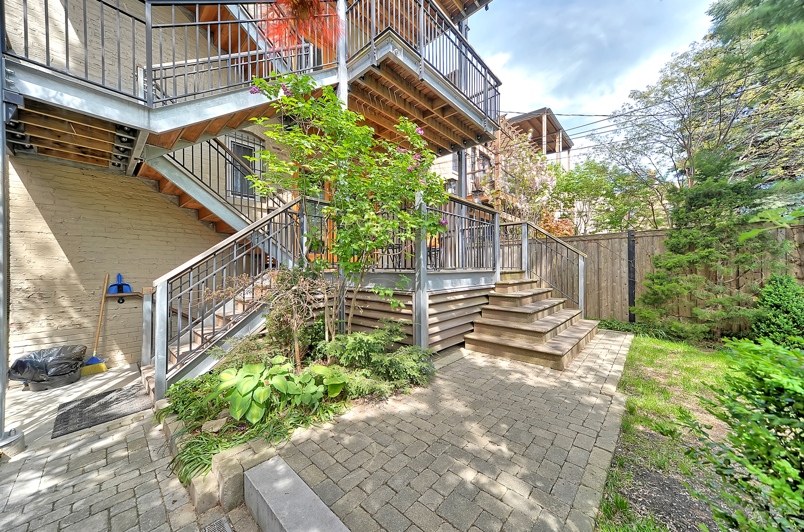 3729 North Wayne Avenue, Unit 2 Chicago, IL 60613 - Photo 15 of 17 a view of a pathway of house with wooden stairs