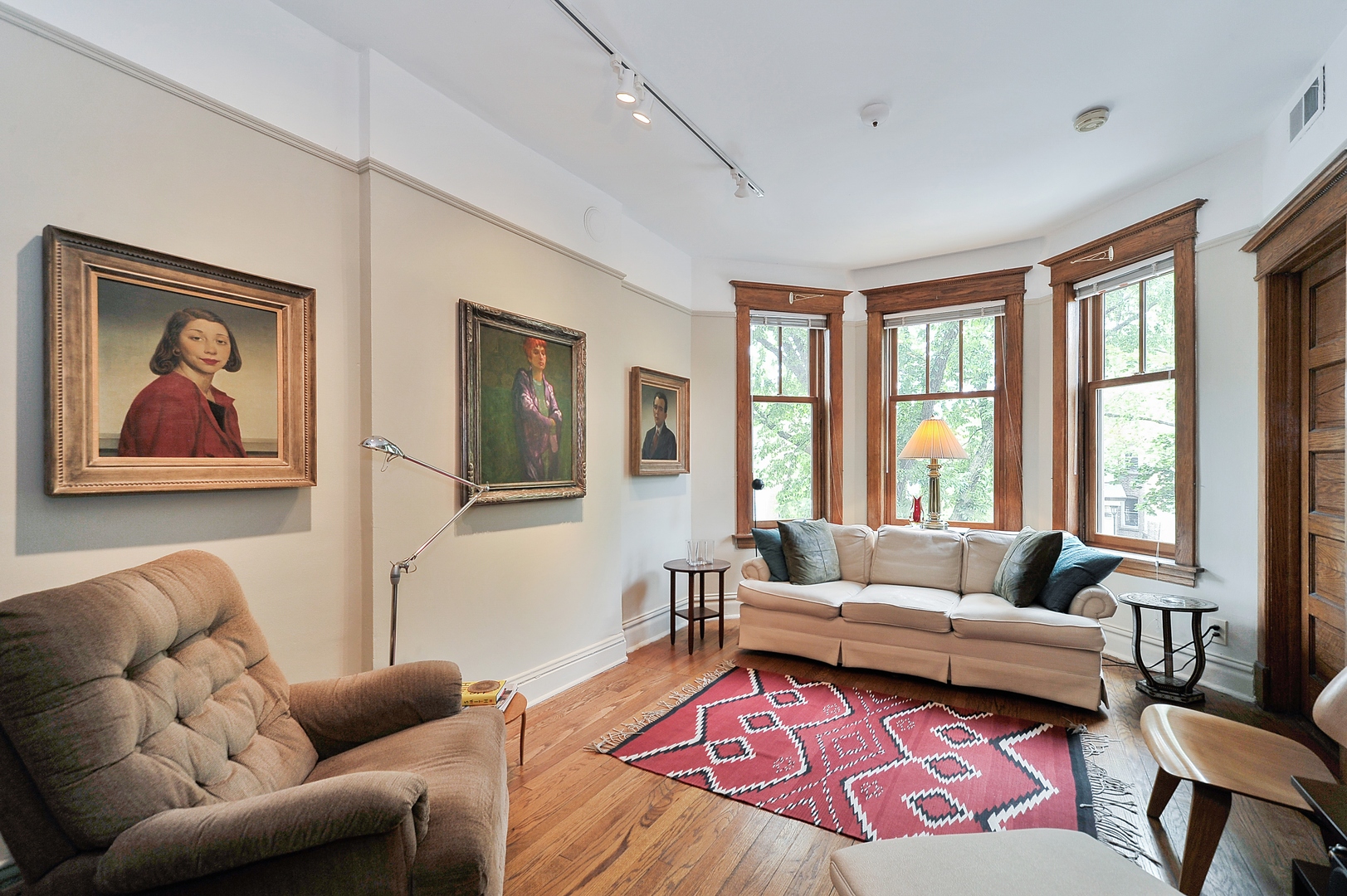 3729 North Wayne Avenue, Unit 2 Chicago, IL 60613 - Photo 3 of 17 a living room with furniture and a large window