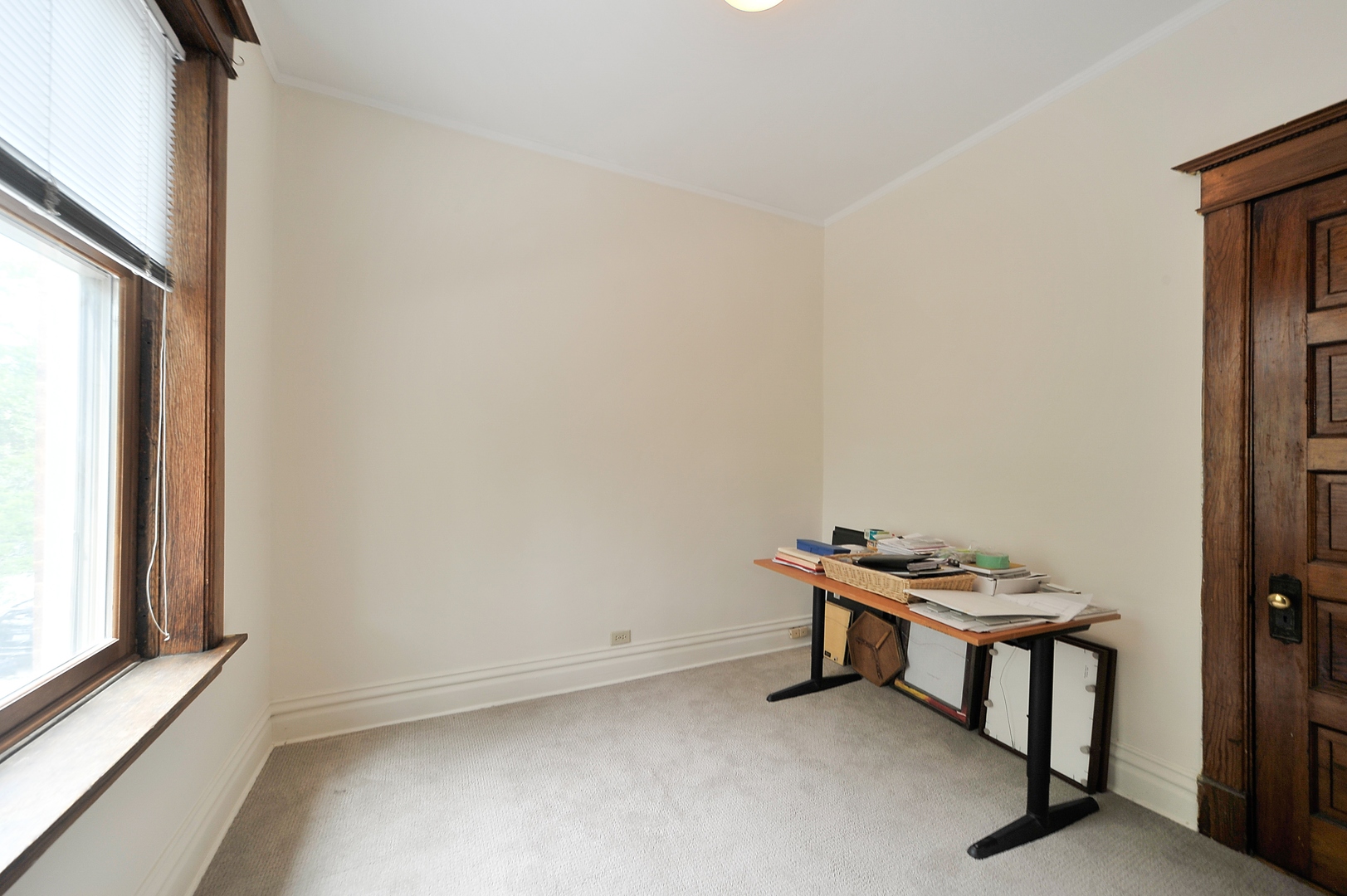 3729 North Wayne Avenue, Unit 2 Chicago, IL 60613 - Photo 9 of 17 a room with furniture and a window