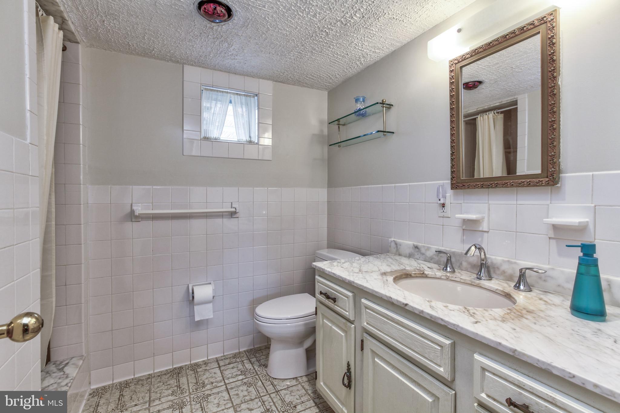2015 Glenhaven Place Silver Spring, MD 20902 - Photo 33 of 47 Lower level full bathroom