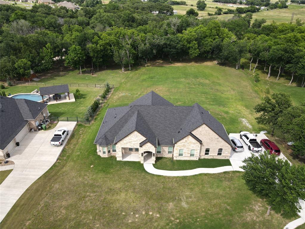 3248 North Cardinal Road Azle, TX 76020 - Photo 1 of 29 Expansive property featuring a stone and brick facade residence with a dark shingle roof