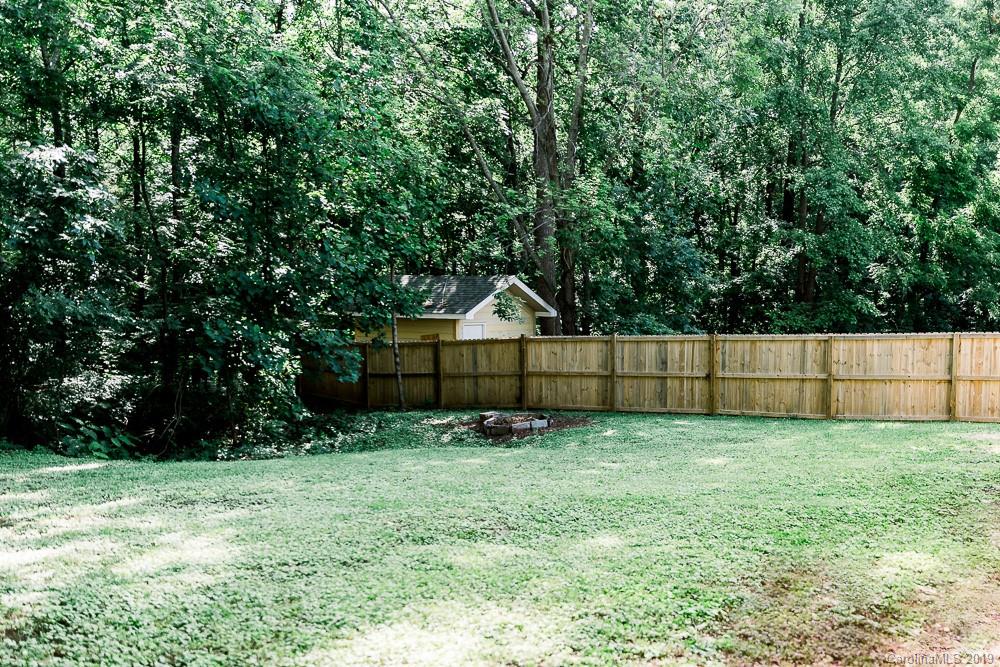 10154 Woody Ridge Road Charlotte, NC 28273 - Photo 2 of 9 a backyard of a house