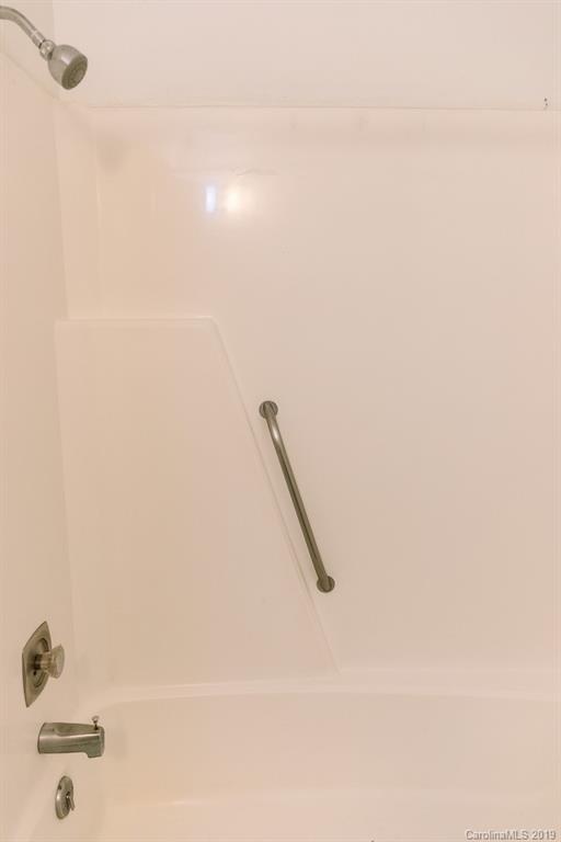 10154 Woody Ridge Road Charlotte, NC 28273 - Photo 6 of 9 a bathroom with a shower
