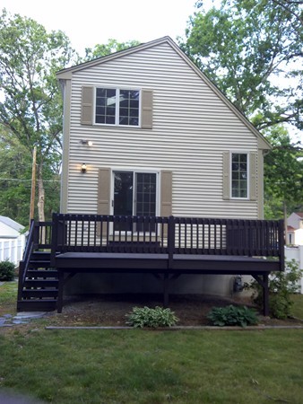 23 Hawthorne Road Holbrook, MA 02343 - Photo 3 of 13 a view of a house with wooden deck and a yard