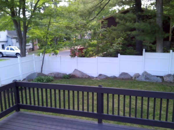23 Hawthorne Road Holbrook, MA 02343 - Photo 4 of 13 a view of a street with wooden fence