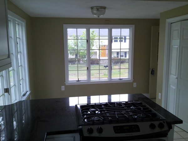 23 Hawthorne Road Holbrook, MA 02343 - Photo 6 of 13 a bed sitting in a bedroom next to a window