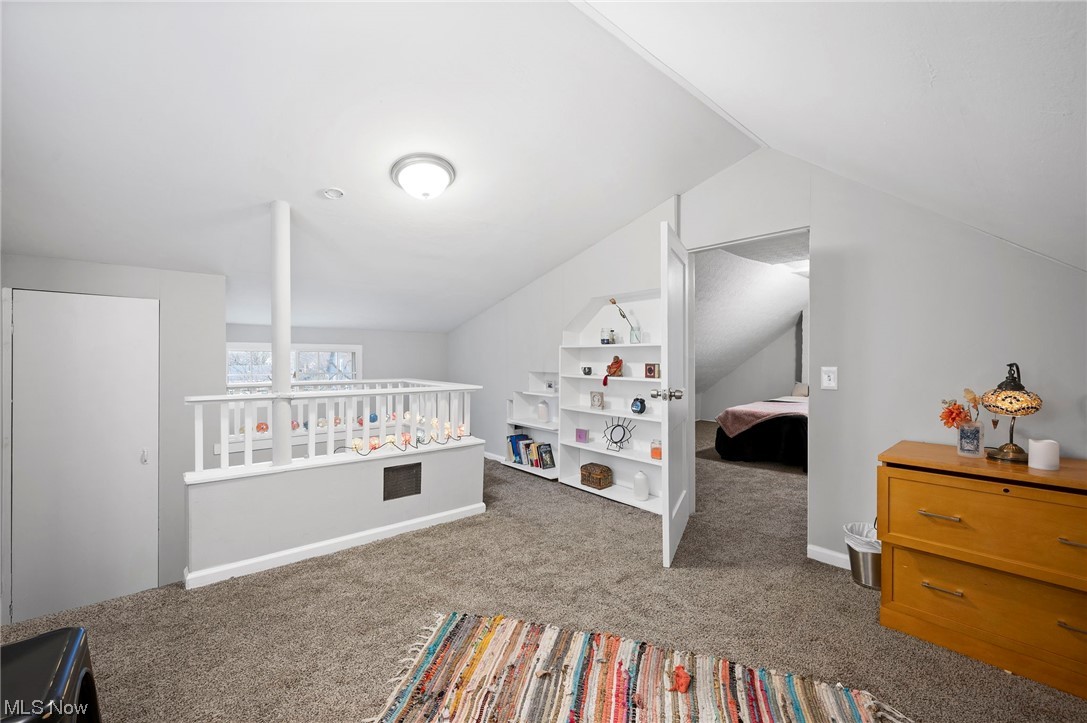 3305 Kildare Road Cleveland, OH 44118 - Photo 19 of 33 Bedroom with vaulted ceiling and carpet