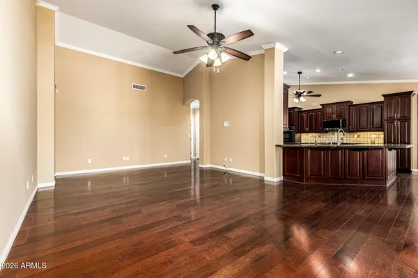 a view of a swimming pool with an outdoor space and seating area