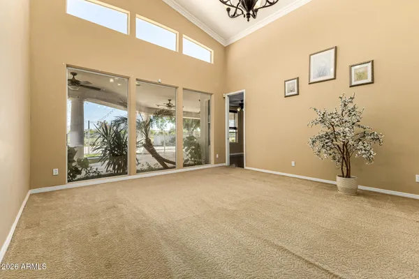 a kitchen with stainless steel appliances granite countertop a sink refrigerator and cabinets